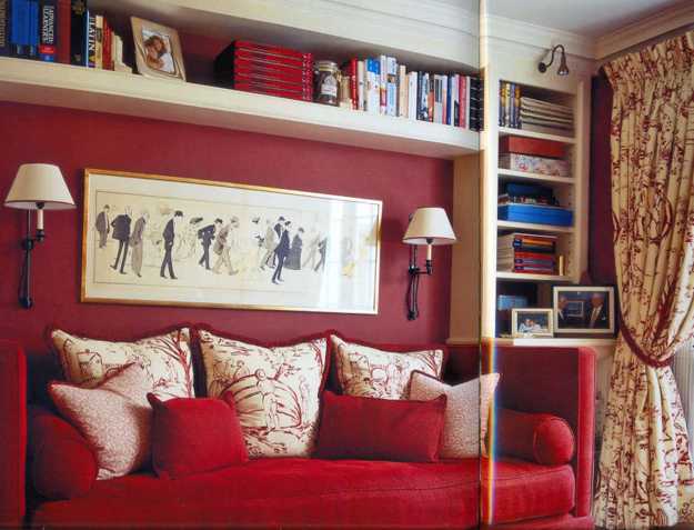 red sofa and wall decoration with art print and wall shelf