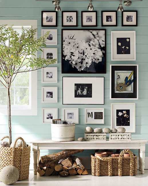 blue wall decoration with black and white photos