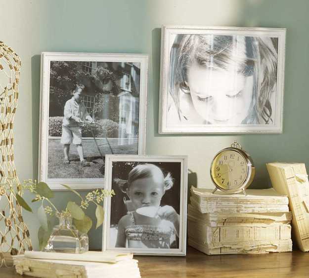 blue wall decoration with family photos