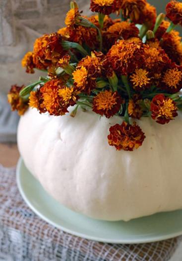 fall decorations, floral arrangements in handmade pumpkin pots and vases