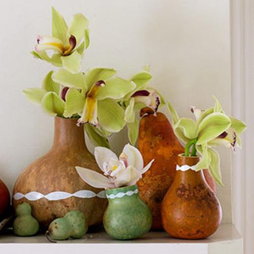 fall decorations, floral arrangements in handmade pumpkin pots and vases