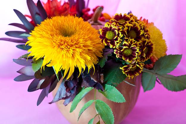 fall decorations, floral arrangements in handmade pumpkin pots and vases