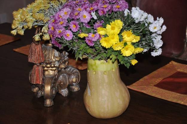 fall decorations, floral arrangements in handmade pumpkin pots and vases