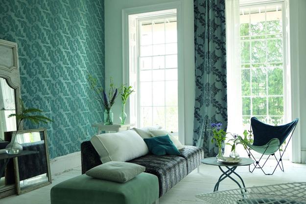 modern room decorate with beautiful wallpaper and home textiles