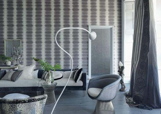 modern room decorate with beautiful wallpaper and home textiles 