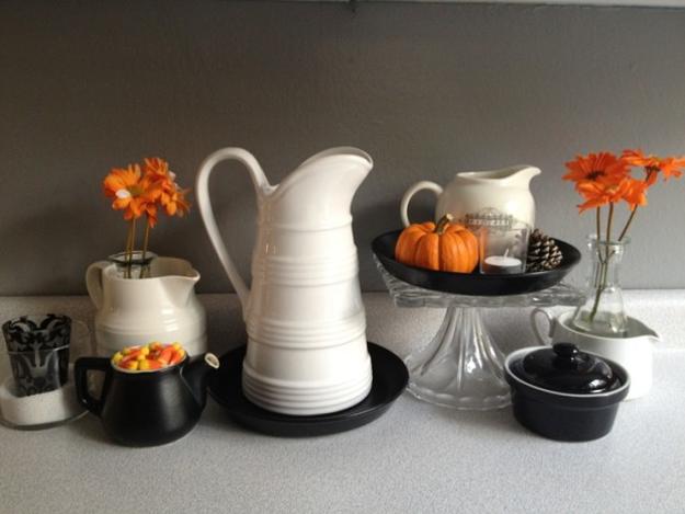 Halloween decoration in black and white colors with orange accents