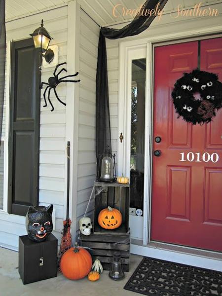 Halloween decoration in black and white colors with orange accents