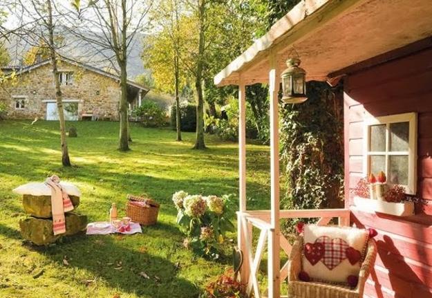  country house with stone walls and outdoor living spaces 