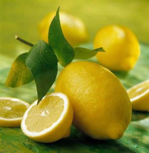 table decorations and centerpieces with lemon, yellow and green color combination