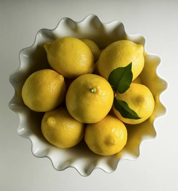 table decorations and centerpieces with lemon, yellow and green color combination