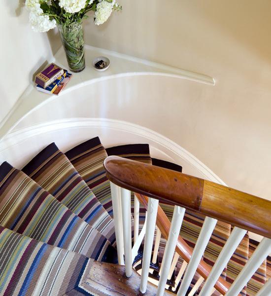 modern interior design with striped rugs and carpets
