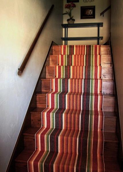 modern interior design with striped rugs and carpets