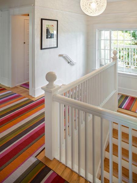 room decor with striped rugs in bright colors