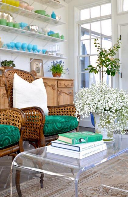 Interior decoration with green accessories, furniture upholstery and green paint